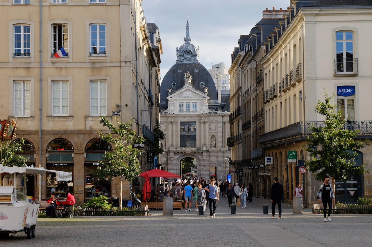 Explore the bustling streets of Rennes, France in this beautiful urban cityscape.